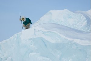 Inuit man on Iceberg